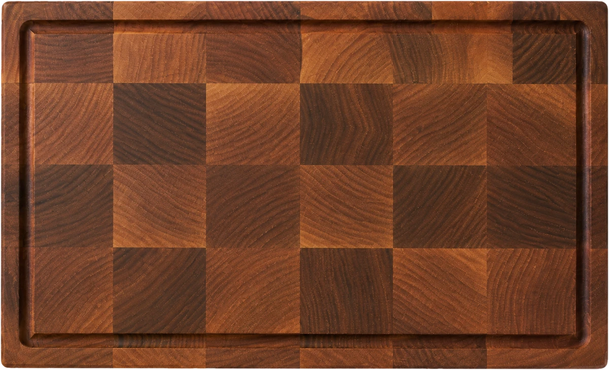 13 by 8 inch GrainWoods end-grain walnut cutting board shown to scale with everyday kitchen items